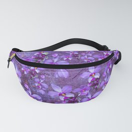 purple orchids on a textured wall Fanny Pack