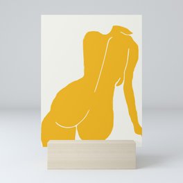 Nude in yellow Mini Art Print