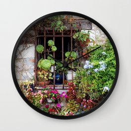 Window full of Plants - Botanical and Nature travel photography - Old window in Small Village in France Wall Clock | Travel, Village, Flowery, Balcony, Summer, Photograph, Window, Plant, Colorful, Plants 