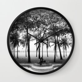 black man sitting in the shade of coconut trees on copacabana beach Wall Clock | Relax, Copacabanabeach, Solitude, Brazil, Sidewalk, Digital Manipulation, Blackandwhite, Black and White, Riodejaneiro, Digital 