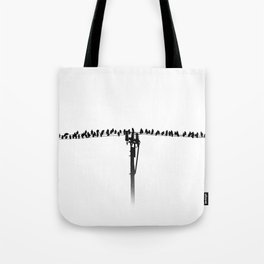 Birds sitting on electrical wires during migration Tote Bag